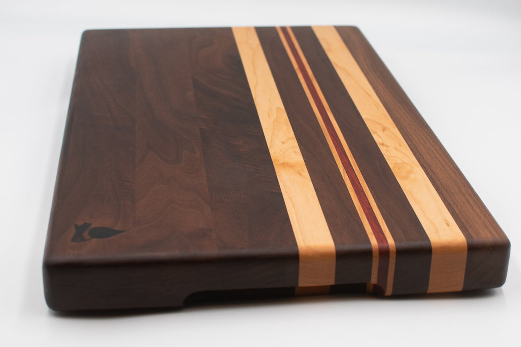 Walnut with stripes of Maple and Padauk Cutting Board
